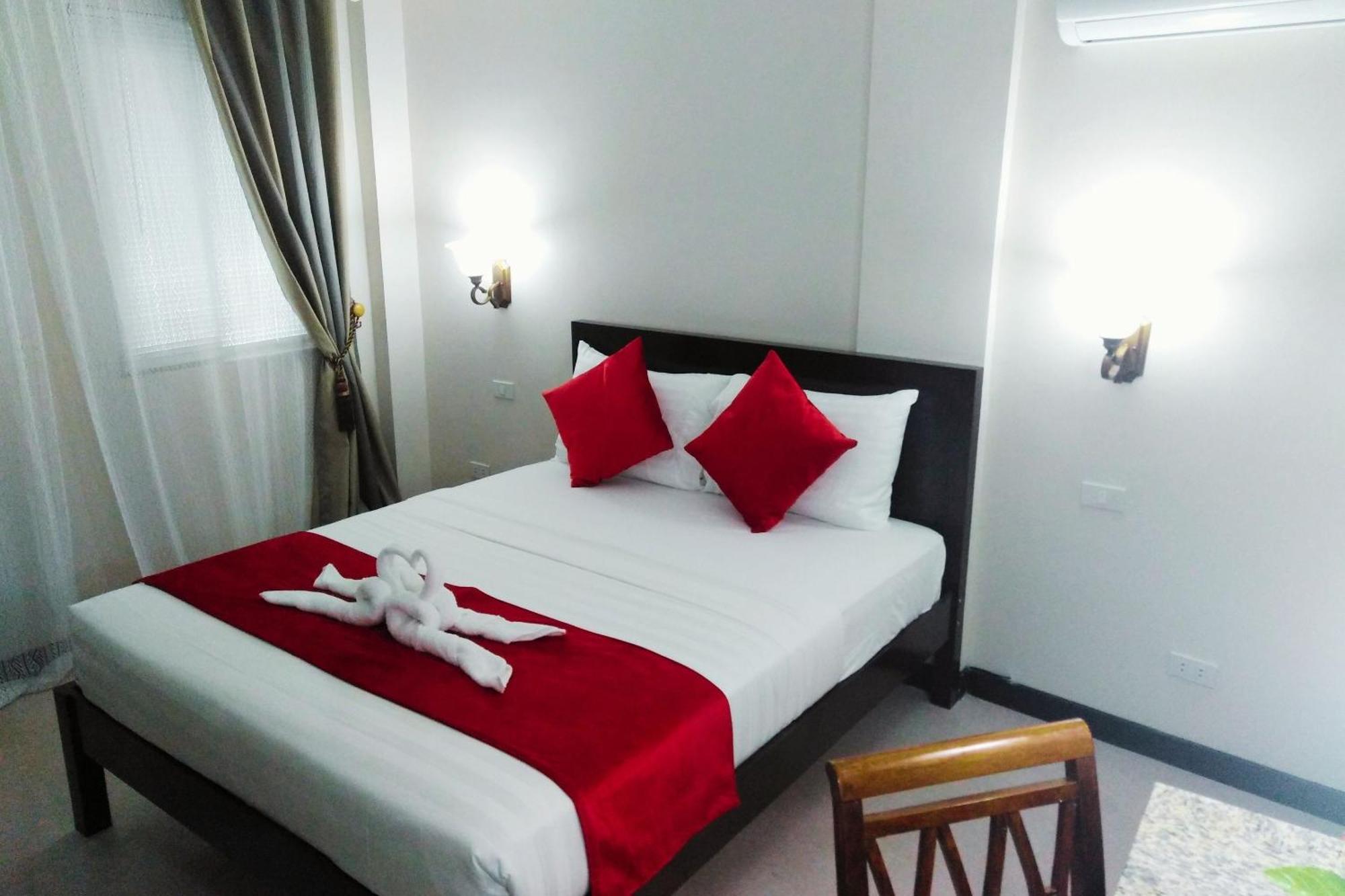 Venezia Suites Hotel Iloilo Camera foto