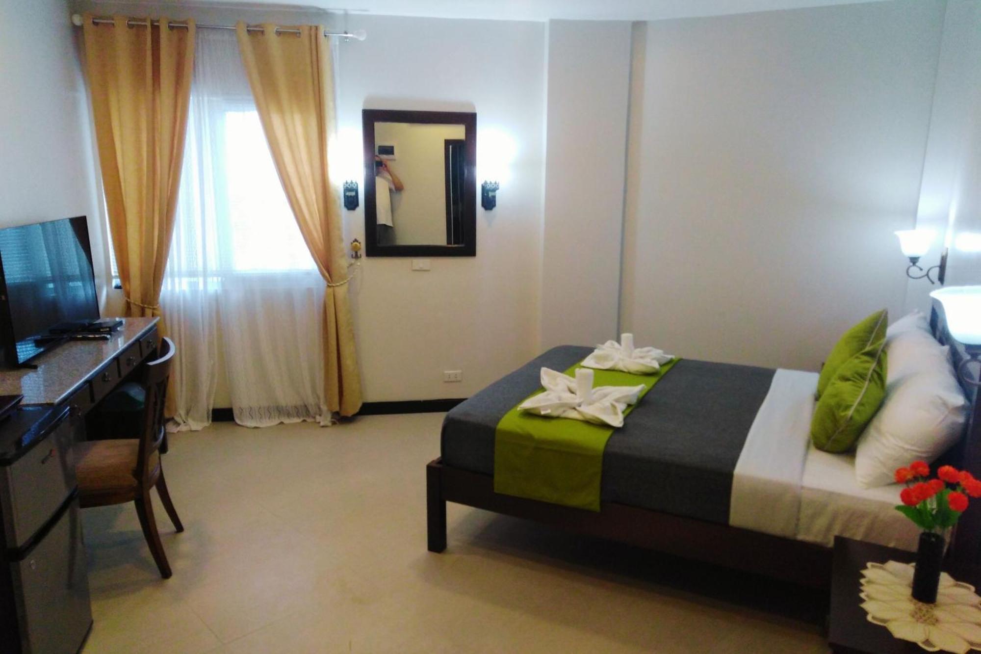 Venezia Suites Hotel Iloilo Camera foto